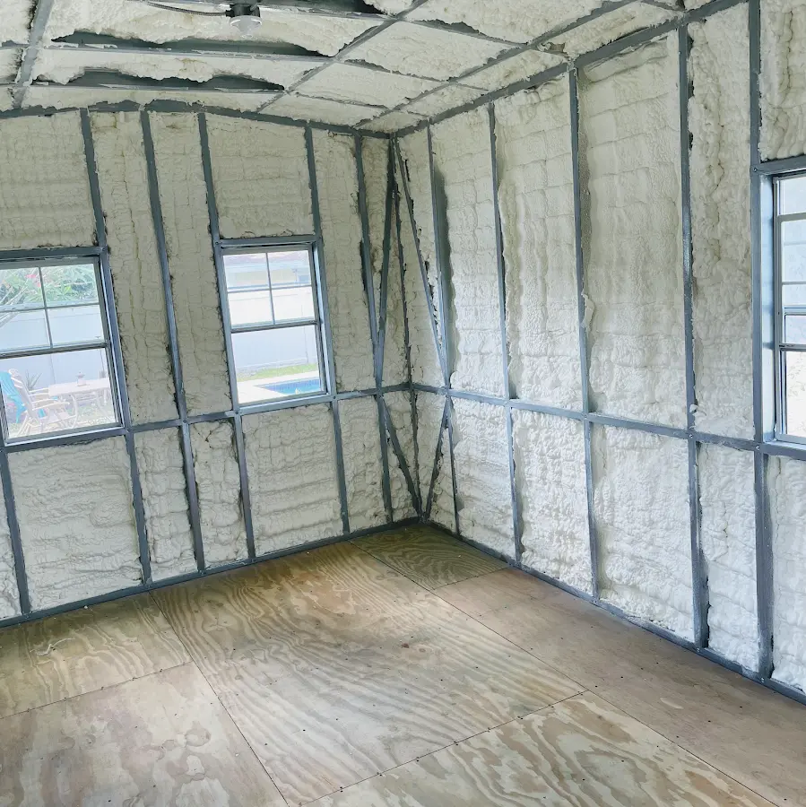 Closed-cell spray foam insulation applied to wall cavities in a residential project in Foxborough